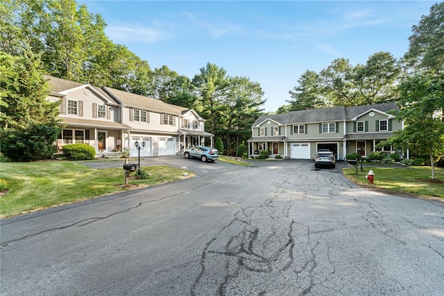 18 Country Hill Ln, Smithfield, RI 02917 - view of front of home with a garage, driveway, and a front yard