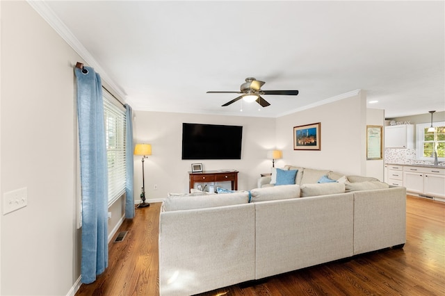 18 Country Hill Ln, Smithfield, RI 02917 - living room featuring a ceiling fan, ornamental molding, and dark wood-style flooring