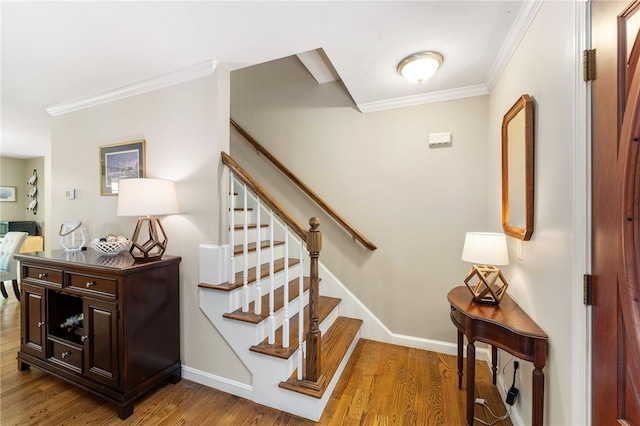18 Country Hill Ln, Smithfield, RI 02917 - stairway with crown molding and wood finished floors