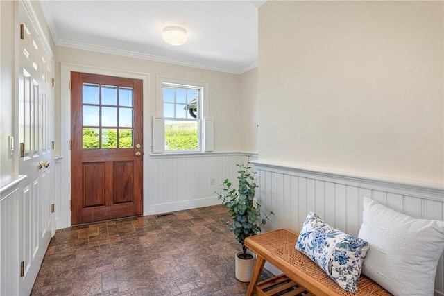 17 Ferolbink Way, Little Compton, RI 02837 - doorway to outside featuring wainscoting, stone finish floors, and ornamental molding