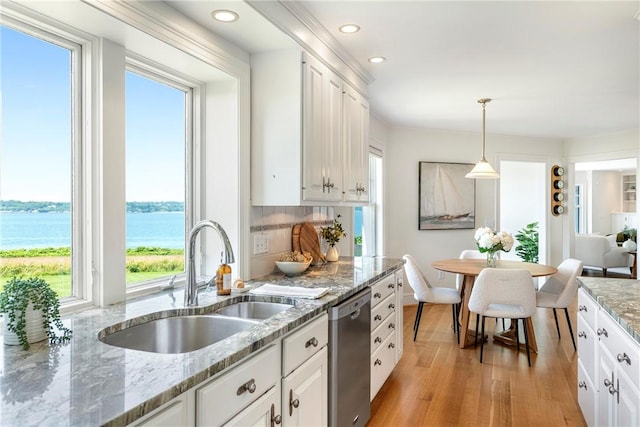 17 Ferolbink Way, Little Compton, RI 02837 - kitchen featuring stainless steel dishwasher, plenty of natural light, light wood finished floors, and recessed lighting