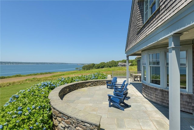 17 Ferolbink Way, Little Compton, RI 02837 - view of patio / terrace featuring a water view