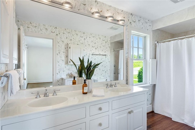 17 Ferolbink Way, Little Compton, RI 02837 - full bath with double vanity, wood finished floors, and curtained shower