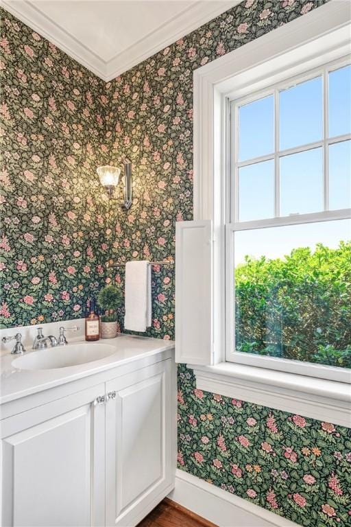 17 Ferolbink Way, Little Compton, RI 02837 - bathroom featuring wallpapered walls, healthy amount of natural light, ornamental molding, and vanity