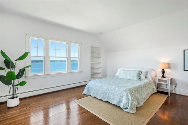 17 Ferolbink Way, Little Compton, RI 02837 - bedroom with lofted ceiling, a baseboard heating unit, and wood finished floors