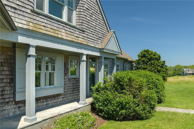 17 Ferolbink Way, Little Compton, RI 02837 - view of exterior entry featuring a yard