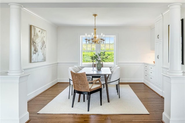 17 Ferolbink Way, Little Compton, RI 02837 - dining space with a chandelier, wood finished floors, ornate columns, and crown molding