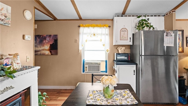 245 Manton St, Pawtucket, RI 02861 - dining area with cooling unit and wood finished floors
