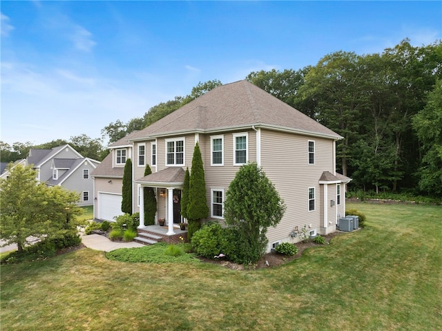 10 Sables Way, Lincoln, RI 02865 - colonial inspired home with a garage, a front lawn, and roof with shingles
