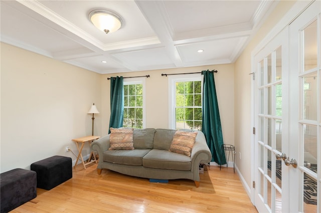10 Sables Way, Lincoln, RI 02865 - sitting room featuring light wood-style floors, beamed ceiling, french doors, coffered ceiling, and recessed lighting