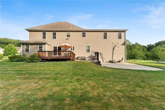 10 Sables Way, Lincoln, RI 02865 - rear view of house featuring a deck, a patio, and a yard