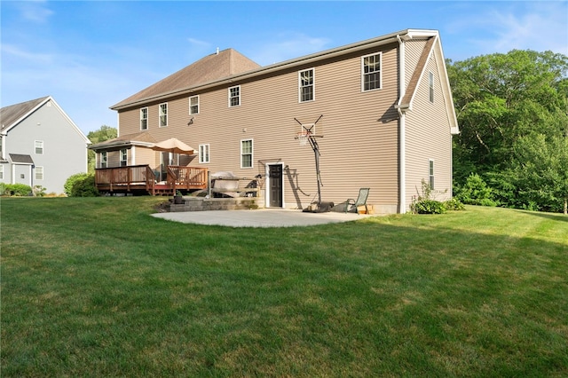 10 Sables Way, Lincoln, RI 02865 - rear view of house featuring a patio, a deck, and a yard