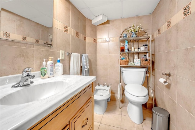 1463 Broadway Way E, Providence, RI 02914 - bathroom with tile walls, a bidet, tile patterned flooring, and vanity