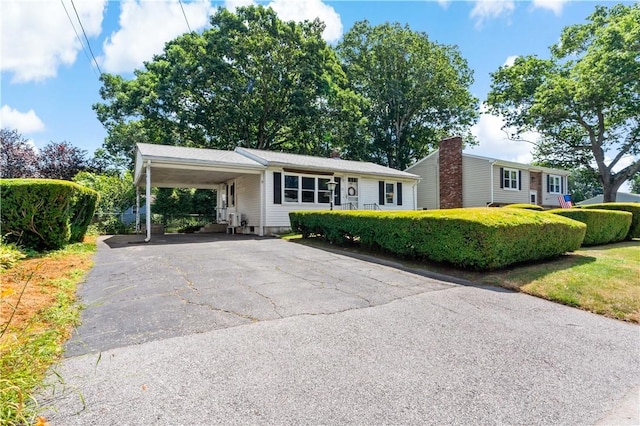55 Wayland Trl, Narragansett, RI 02882 - single story home featuring driveway and a carport
