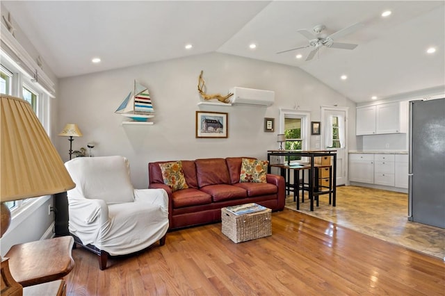 55 Wayland Trl, Narragansett, RI 02882 - living room featuring an AC wall unit, light wood-style flooring, vaulted ceiling, recessed lighting, and ceiling fan