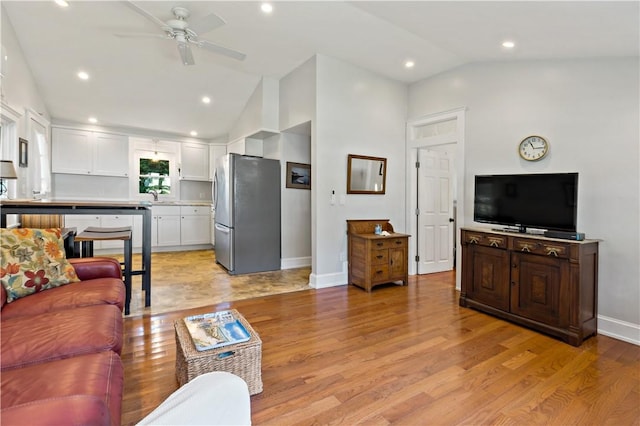 55 Wayland Trl, Narragansett, RI 02882 - living area featuring vaulted ceiling, a ceiling fan, light wood finished floors, and recessed lighting