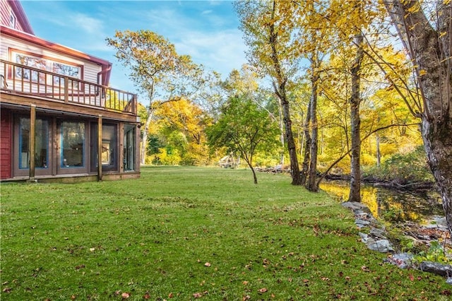 584 Division Rd, East Greenwich, RI 02818 - view of grassy yard with a deck