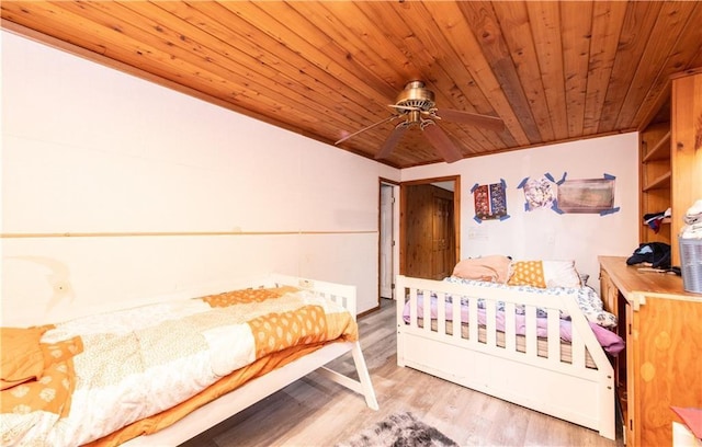 584 Division Rd, East Greenwich, RI 02818 - bedroom featuring wooden ceiling, light wood finished floors, and a ceiling fan