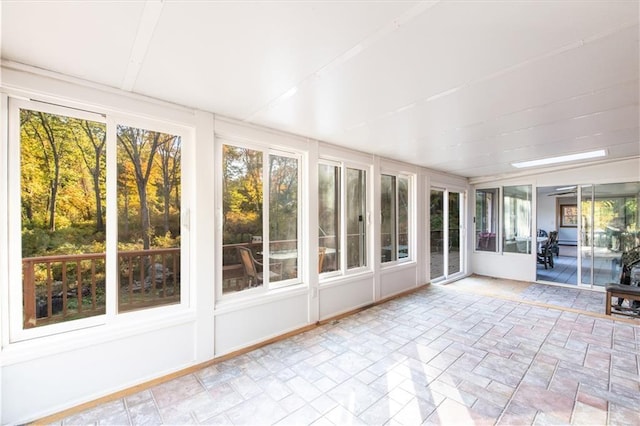 584 Division Rd, East Greenwich, RI 02818 - unfurnished sunroom featuring brick patterned floors