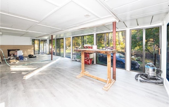 584 Division Rd, East Greenwich, RI 02818 - unfurnished sunroom featuring expansive windows and wood finished floors