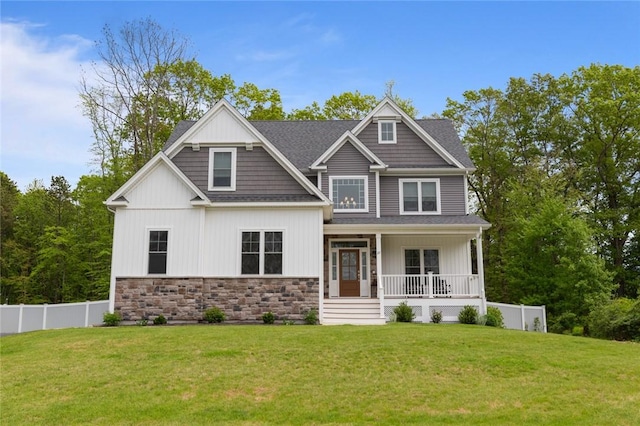 25 Kristin Dr, Cranston, RI 02921 - craftsman-style house featuring covered porch, stone siding, and roof with shingles