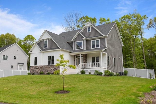 25 Kristin Dr, Cranston, RI 02921 - craftsman-style house with covered porch, stone siding, board and batten siding, and a shingled roof