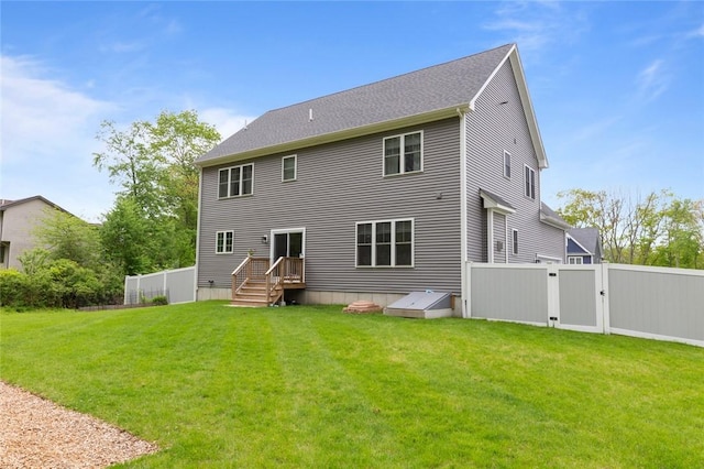 25 Kristin Dr, Cranston, RI 02921 - rear view of house with a gate