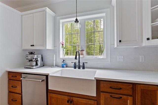 25 Kristin Dr, Cranston, RI 02921 - kitchen with decorative backsplash, healthy amount of natural light, light countertops, and ornamental molding