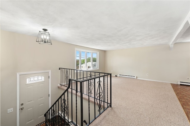 19 Cantara St, West Warwick, RI 02893 - staircase with baseboard heating and a chandelier