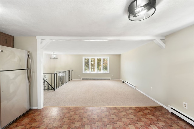 19 Cantara St, West Warwick, RI 02893 - carpeted empty room featuring baseboard heating, a baseboard radiator, and brick patterned flooring