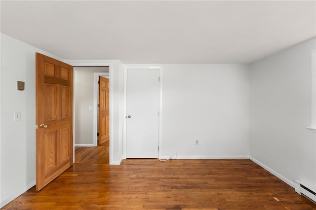 19 Cantara St, West Warwick, RI 02893 - unfurnished room with baseboard heating and wood finished floors
