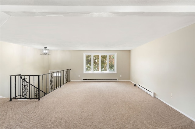 19 Cantara St, West Warwick, RI 02893 - unfurnished room with a baseboard radiator and carpet floors