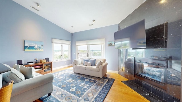 4090 Post Rd Unit B, Warwick, RI 02886 - living area featuring wood finished floors and high vaulted ceiling