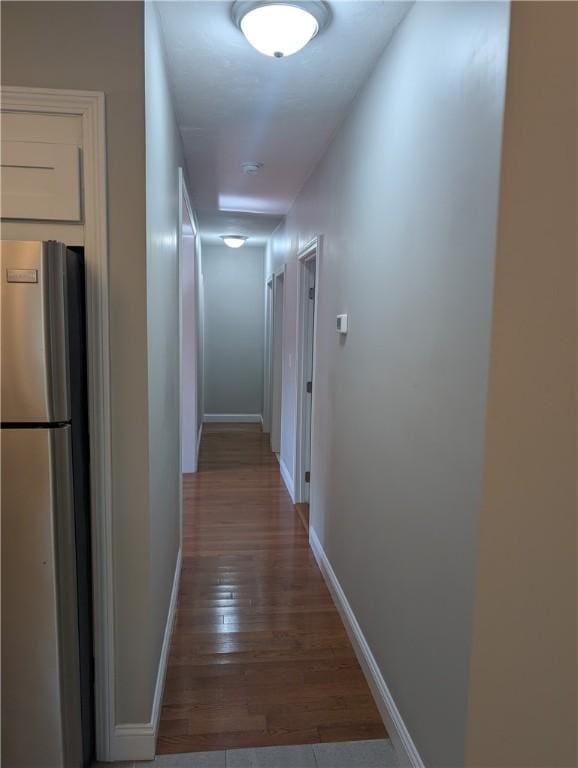 193 Howell St Unit 3, Providence, RI 02906 - hallway featuring wood finished floors and baseboards