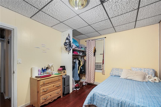 236 Vermont Ave, Providence, RI 02905 - bedroom with wood finished floors, a closet, a paneled ceiling, and cooling unit