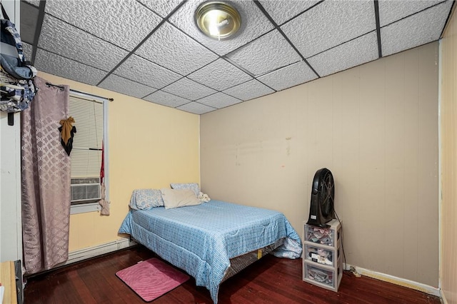 236 Vermont Ave, Providence, RI 02905 - bedroom with wood-type flooring, baseboard heating, and cooling unit