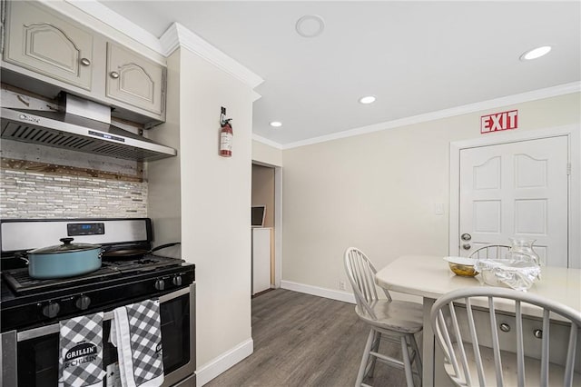 236 Vermont Ave, Providence, RI 02905 - kitchen with stainless steel gas stove, dark wood-style flooring, ornamental molding, recessed lighting, and light countertops