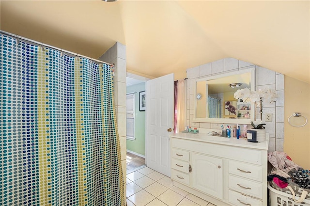 236 Vermont Ave, Providence, RI 02905 - bathroom featuring tile patterned floors, vanity, lofted ceiling, and a shower with shower curtain