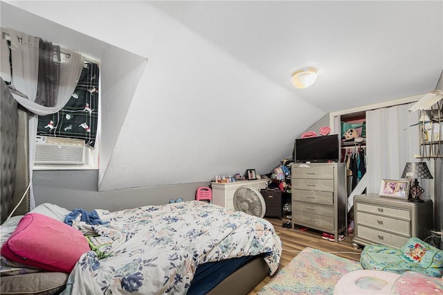 236 Vermont Ave, Providence, RI 02905 - bedroom featuring wood finished floors, lofted ceiling, a closet, and cooling unit