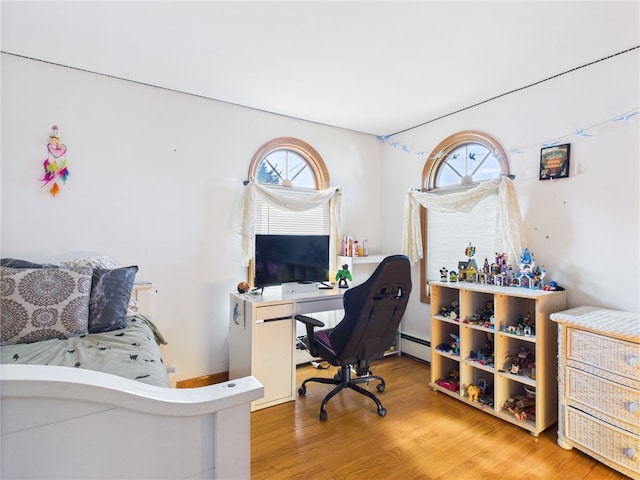 128 Arbor Ter, Tiverton, RI 02878 - office space featuring a baseboard heating unit, plenty of natural light, and wood finished floors