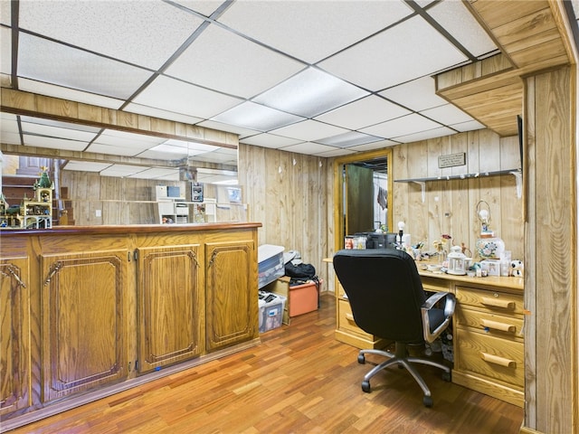 128 Arbor Ter, Tiverton, RI 02878 - office area with wooden walls, light wood-style flooring, and a paneled ceiling