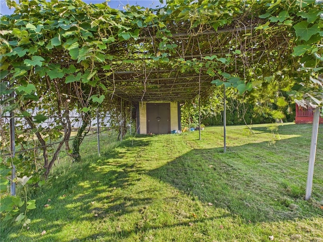 128 Arbor Ter, Tiverton, RI 02878 - view of green lawn featuring a storage shed