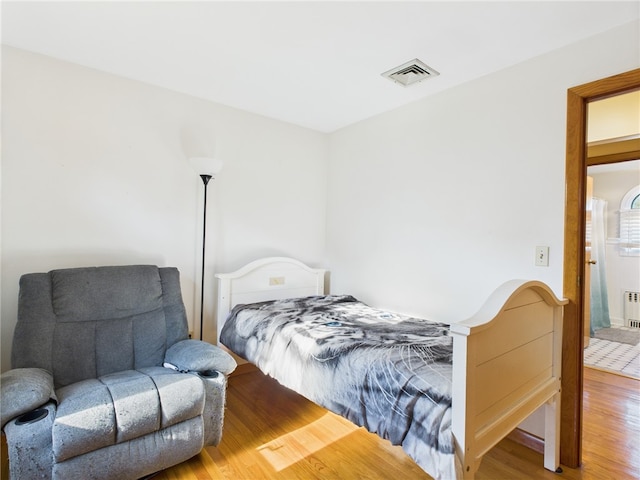 128 Arbor Ter, Tiverton, RI 02878 - bedroom featuring wood finished floors and radiator