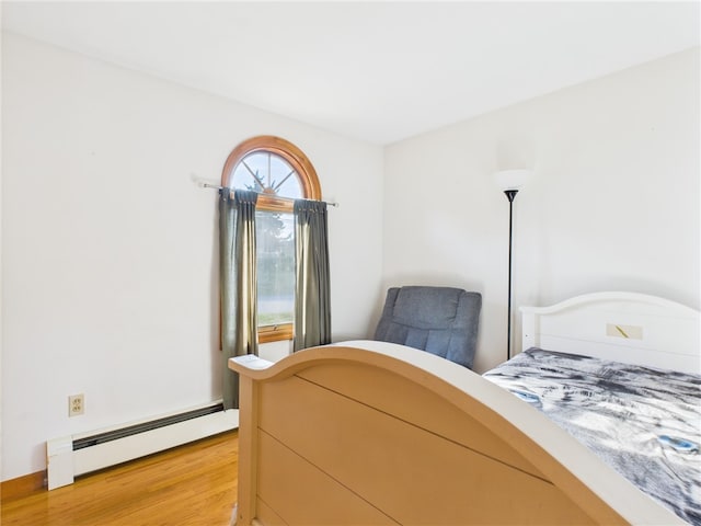 128 Arbor Ter, Tiverton, RI 02878 - bedroom featuring baseboard heating and light wood-style floors