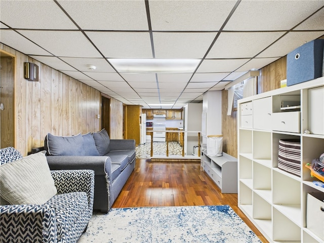 128 Arbor Ter, Tiverton, RI 02878 - living room with wood walls, a paneled ceiling, and wood finished floors