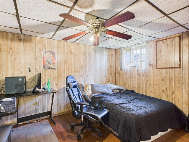 128 Arbor Ter, Tiverton, RI 02878 - bedroom featuring wooden walls, wood finished floors, and a drop ceiling