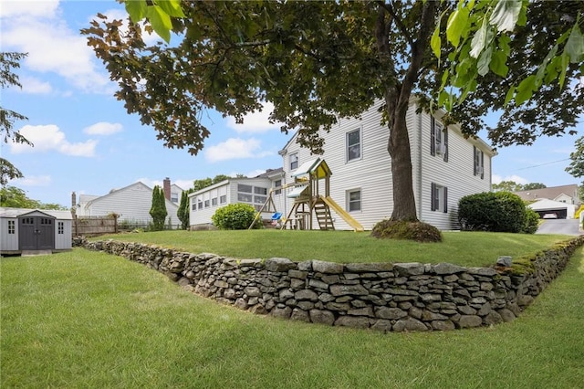 57 Hillside Rd, Lincoln, RI 02865 - view of yard featuring a shed and a playground
