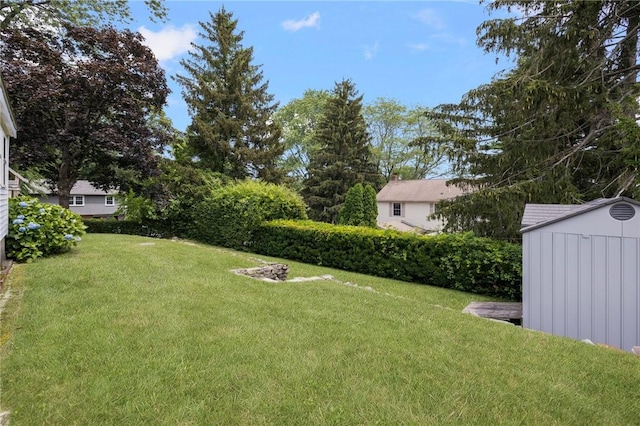 57 Hillside Rd, Lincoln, RI 02865 - view of green lawn with a storage shed