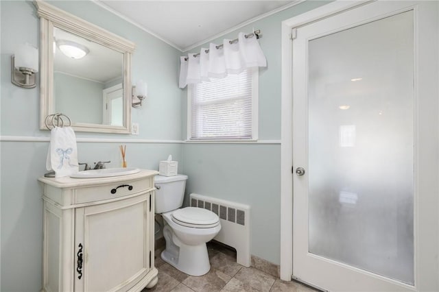 57 Hillside Rd, Lincoln, RI 02865 - bathroom with radiator, vanity, and ornamental molding