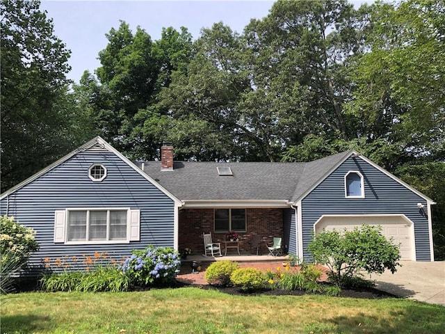 2 Marywood Ln, Cumberland, RI 02864 - view of front facade featuring a chimney, driveway, a shingled roof, brick siding, and view of scattered trees